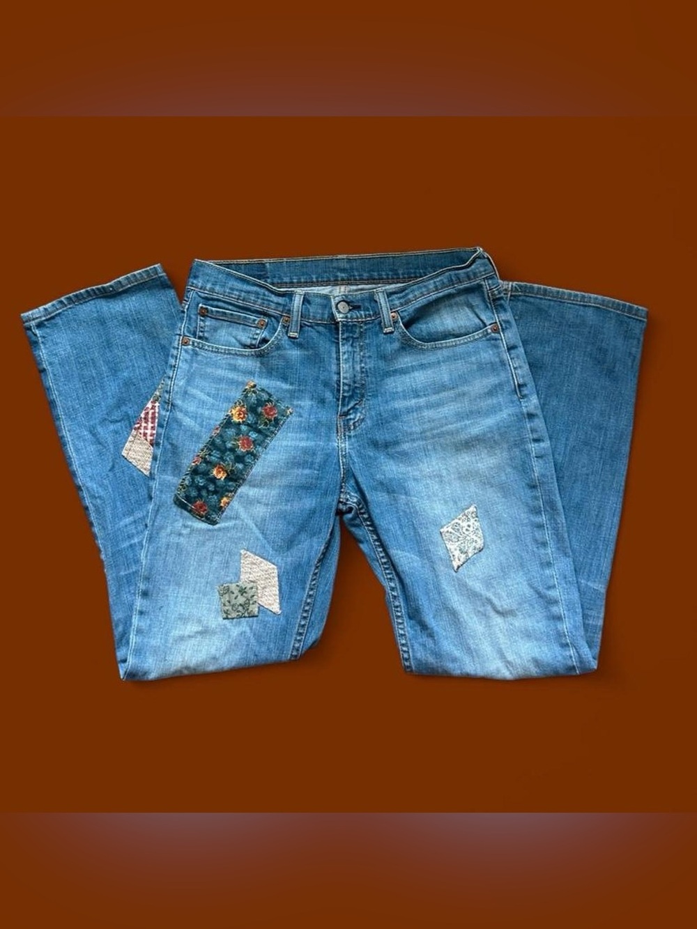 Levi's Light Blue Straight Leg Jeans with Patchwork Accents